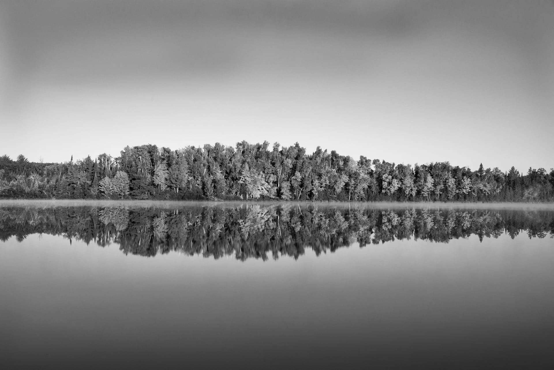 Calm morning over the water with soft light